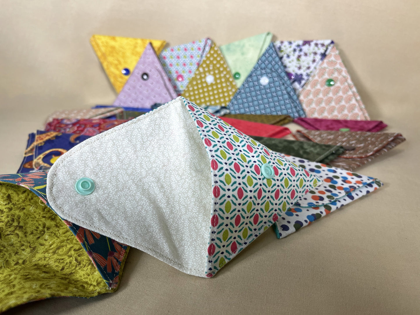 Monedero triangular