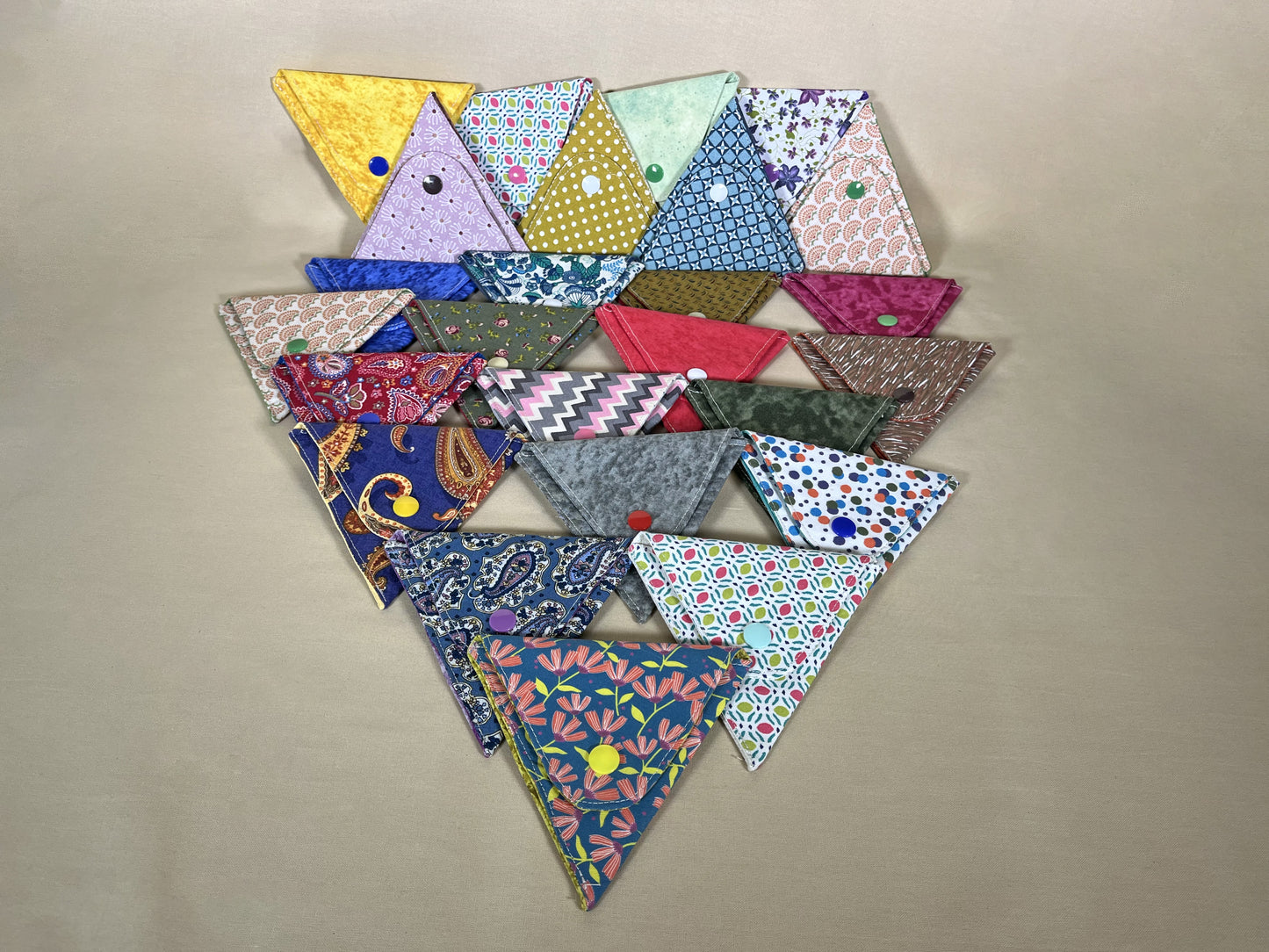 Monedero triangular
